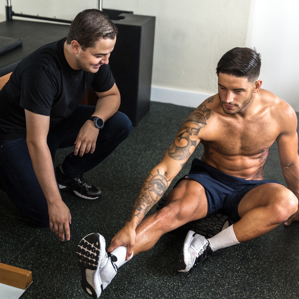 Therapist assisting an man in therapy