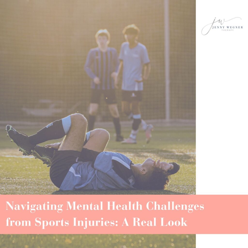 Soccer player lying on the field holding his leg in pain