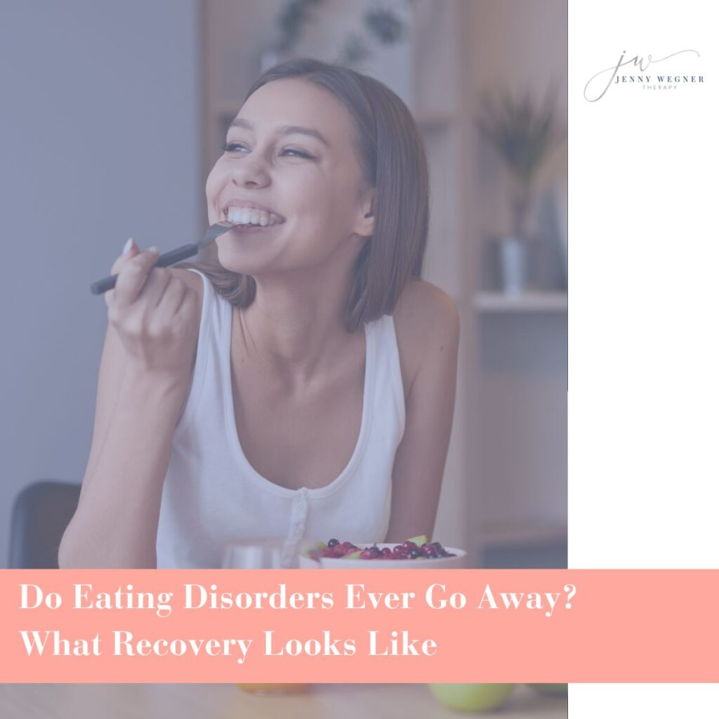Smiling woman enjoying a bowl of fruit